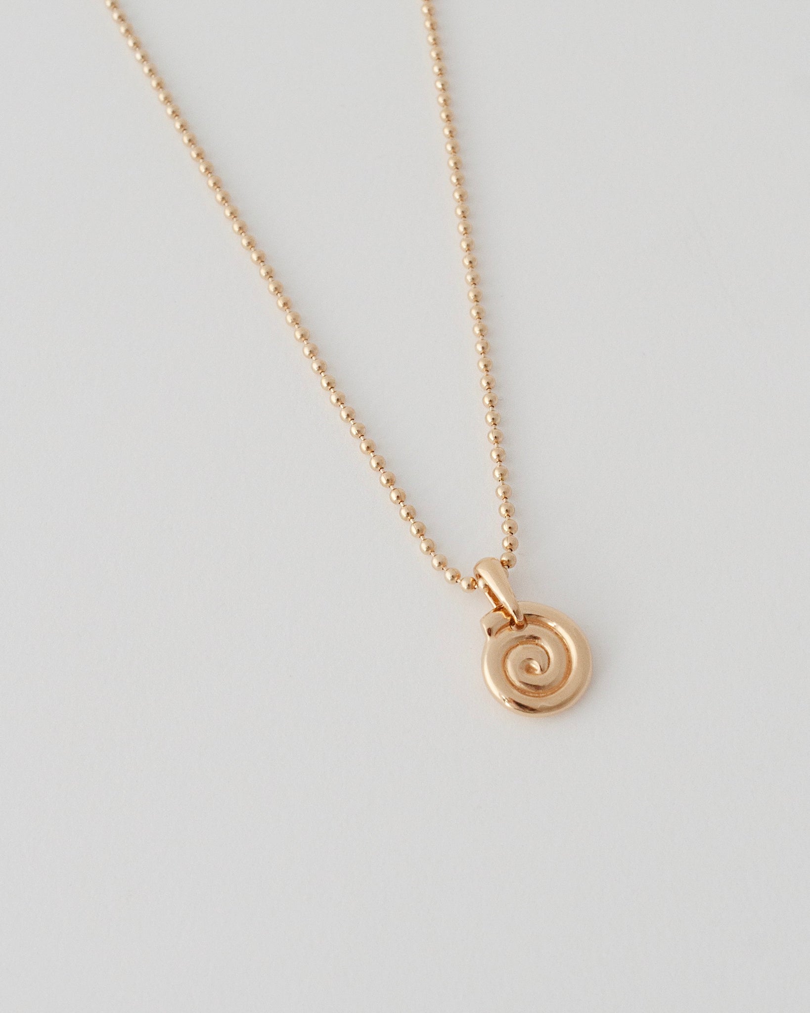 EXISTENTIAL SWIRL NECKLACE